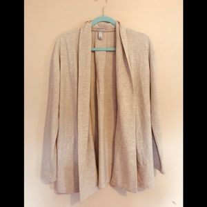 Cream colored cardigan, size M.